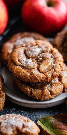 some cookies and apples on a table