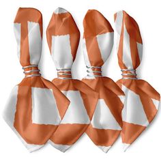 four orange and white striped ties tied to each other on a white background with clippings