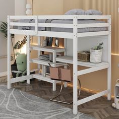 a white bunk bed sitting on top of a wooden floor next to a desk and chair