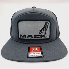 a gray trucker hat with the word mack on it