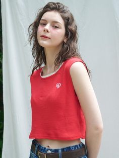 This is a trendy and casual top by LOSSYROW that is made out of high quality and sturdy material. With distinctive mood of the design and comfortable wear, you can style it for your casual daily outfit.- Lace detail on the neckline- Signature logo embroidery on the chest- Cool touch of fabric with eyelets Fitted Red Cotton Tops, Trendy Sleeveless Cotton Top, Trendy Crew Neck Cotton Vest, Trendy Sleeveless Blouse Vest Top, Red Casual Sleeveless Blouse, Trendy Cotton Crop Top Vest, Trendy Sleeveless Vest Top, Trendy Cotton Cropped Vest, Casual Red Sleeveless Blouse