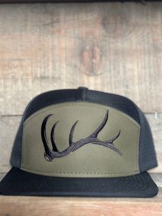 This is a vented solid back 7 panel snap back hat. Army green embroidery  Elk shed design One size fits most copyright ©️ A. Vigil 2018 all rights reserved Green Trucker Snapback Hat With Flat Bill, Outdoor Snapback Baseball Cap, Green Outdoor Fitted Hat, Green Fitted Hat For Outdoor, Green Trucker Baseball Cap With Flat Brim, Outdoor Snapback Hat With Curved Bill, Outdoor Trucker Hat With Flat Brim, Green Trucker Cap With Flat Brim, Green Trucker Snapback Hat With Curved Bill