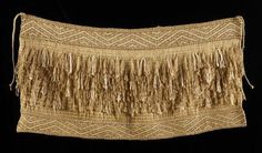 an old piece of cloth with fringes on it