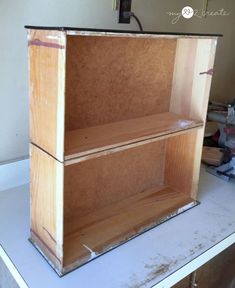 a wooden shelf sitting on top of a counter