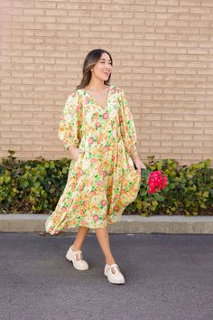 Add a pop of color to your wardrobe with our Aliyah Tie Front Puff Sleeve Midi Dress in Yellow. This beautiful dress features a playful tie detail, short sleeves, and a charming floral print. Perfect for a sunny summer day! Paired with THE GRETA PLATFORM LOAFERS IN BONE V-neck with tie string Midi length Puff sleeves Pockets Clean hem Lined Self: 100% Rayon, Lining: 100% Polyester Model is 5'5" wearing a small. Length (shoulder to hem): Small: 48”, Medium: 48.5”, Large: 49” To view our return po Playful Short Sleeve Dresses For Brunch, Playful Knee-length Spring Dress, Yellow Cotton Puff Sleeve Dress, Yellow Puff Sleeve Cotton Dress, Playful Puff Sleeve Summer Dress, Casual Yellow Puff Sleeve Midi Dress, Yellow Knee-length Midi Dress For Spring, Casual Yellow Puff Sleeve Dress, Spring Yellow Short Sleeve Dresses