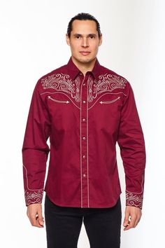 Label: RODEO CLOTHING Material : 55% Cotton 45% Polyester Description: Men's long sleeve cotton/poly western shirts. CARE INFORMATION: machine wash warm mild soap do not bleach tumble dry low heat warm iron PATTERN: Solid FABRIC TYPE: Woven COLLAR STYLE: Regular Western Collar MATERIAL: 55% Cotton 45% Polyester STYLE: Regular fit western style embroidery OTHER FEATURE: 55P% COTTON/ 45% POLY POPLIN FABRIC POCKETS WITH PIPING SNAP BUTTONS SOLID FABRIC REGULR FIT EMBROIDERY ON THE FRONT AND BACK YOKE MENS STYLE WESTERN STYLE Cheap Men's Rodeo Shirt, Western Long Sleeve Shirt For Spring, Spring Western Long Sleeve Shirt, Fitted Long Sleeve Shirt For Western-themed Events, Western Long Sleeve Shirt With Button Closure, Western Style Long Sleeve Shirt For Western-themed Events, Western Style Red Long Sleeve Tops, Western Style Long Sleeve Cotton Tops, Red Western Long Sleeve Tops