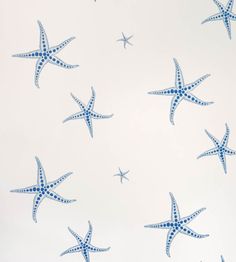 blue and white wallpaper with starfishs in the sky on a white background