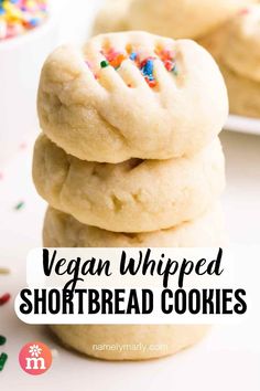 vegan whipped shortbread cookies stacked on top of each other