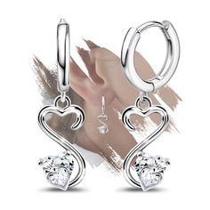 PRICES MAY VARY. Size: The diameter of the open heart earrings is 1.4cm(0.55inch), the total height is 3.1cm(1.22 inches), and the width is 0.95cm(0.37 inches). A single heart-shaped diamond has a size of 0.6cm(0.23 inches) and a total weight of 4g. Lightweight and comfortable, exquisite and fashionable, suitable for daily wear. Open Heart Earrings: An open heart hoop earrings expresses love and bond towards those who open their hearts, wearing open heart jewelry to express their love and bond. Hoop Earrings With Charm, Open Heart Earrings, Gifts For Daughter, Heart Hoop Earrings, Dangle Hoop Earrings, Wife Birthday, Sparkle Earrings, Heart Shaped Diamond, Earrings Crystal