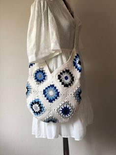 Introducing our charming Granny Square Bag! Handcrafted with love, this delightful accessory combines the old-world granny square crochet technique with a modern twist. The intricate patterns and vibrant colors come together to create a unique and eye-catching design. Perfect for any occasion, this versatile bag easily holds all your essentials while adding a touch of bohemian chic to your outfit. Whether you're heading to the farmer's market or strolling through the city, our Granny Square Bag is sure to turn heads and showcase your individual style. Add a vibrant pop to your wardrobe with this must-have accessory today! ✅Handmade by me crochet shoulder bags in 100% cotton ✅The bag has cotton lining. ✅A lining of the appropriate color is sewn into the crochet bag. ✅Knitted boho purse can Everyday White Hand Knitted Shoulder Bag, Everyday White Crochet Hand Knitted Bag, Everyday White Handmade Crochet Bag, White Crochet Bag With Granny Square For Summer, Vintage Handmade Crochet Bag For Everyday, Vintage Rectangular Crochet Bag With Granny Square, Bohemian Granny Square Bags For Everyday, Beach Granny Square Shoulder Bag, Bohemian Granny Square Everyday Bag