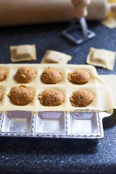 some food is laying out on a baking sheet and ready to be baked in the oven