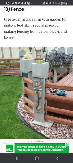 an image of a garden with flowers and plants on the ground, in front of a fence