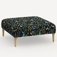 a footstool with an animal print on it