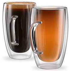 two large mugs with handles are shown side by side, one is filled with liquid and the other has a handle