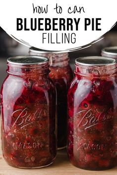 three jars filled with blueberry pie filling