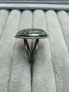 25x18mm Natural Oval Green Ripple Jasper Ring.  Handmade in USA.  Ring size 8.  925 Silver. Since the ring is handcrafted from sterling silver, it's resistant to all usual environmental factors and it doesn't cause any allergies or skin irritation. It may tarnish and darken with time, same as all silver jewelry but if you don't like this antique look of silver, you can easily polish it back into a mirror finish. Made with high-quality materials, this ring is both durable and stylish. Whether you Handmade Adjustable Oval Emerald Ring, Handmade Oval Turquoise Ring For Formal Occasions, Handmade Oval Turquoise Ring For Formal Events, Artisan Silver Oval Emerald Ring, Jasper Ring, Usa Jewelry, Green Jasper, Silver Rings Handmade, 925 Sterling Silver Ring