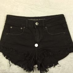 American Eagle Jean Shorts Womans Size 12 Black Denim Hi-Rise Festival Raw Hem Black Cotton Cutoff Shorts, Black Fitted Cutoff Jean Shorts, Mid-rise Black Cotton Jean Shorts, Black Cotton Jean Shorts With Frayed Hem, Black Jean Shorts With Frayed Hem For Spring, Fitted Black Jean Shorts With Frayed Hem, Black Cotton Shorts With Frayed Hem, Summer Black Jeans With Frayed Hem, Black Cotton Jean Shorts For Spring