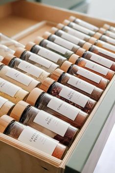 an open drawer with spices in it