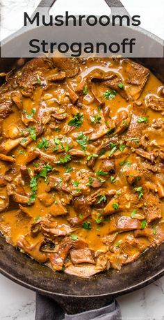 mushrooms and gravy in a skillet with text overlay that reads mushroom's stroganoofff