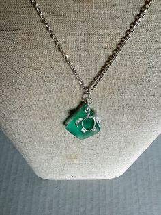 This beautiful Mermaid Bauble will glam up any outfit! Handpicked piece if green sea glass on a silver chain. Every Must Be A Mermaid Piece comes with a complimentary cleaning cloth and in a teal sashe. Green Recycled Glass Pendant Jewelry, Green Jewelry With Silver Chain As Gift, Green Adjustable Chain Jewelry For Beach, Green Adjustable Chain Necklace For Beach, Green Glass Jewelry With Adjustable Chain, Green Jewelry With Adjustable Chain For Beach, Green Necklace With Adjustable Chain For Beach, Green Recycled Glass Jewelry For The Beach, Green Recycled Glass Beach Jewelry