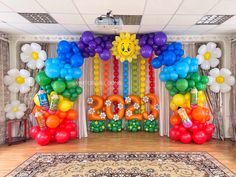 an entrance decorated with balloons and decorations