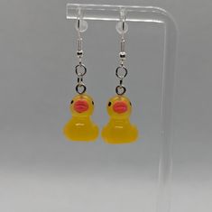 These Are Handmade, Rubber Ducky / Duck Shaped, Silver Toned Dangle Earrings. If You Have Any Questions Please Feel Free To Message Me! I'm Open To Offers And Bundles Are Welcome! Handmade By Me! Duck Earrings, Ducky Duck, Rubber Ducky, Hand Crafted Jewelry, Crafted Jewelry, Accessories Jewelry Earrings, Women Accessories Jewelry, Handcrafted Jewelry, Jewelry Crafts