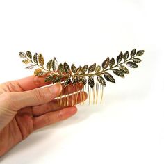 Gold Metal Laurel Tree Leaves Side Hair Comb #0828Colors may appear slightly different through this website due to computer picture resolution and individual monitor settings.Package included : order quantity × hair combItem Features :.Golden tone metal leaves hair comb.Timeless and feminine design hair accessory.Add an elegant touch to your hair style.Wear it for any occasionItem Specifications :.Handmade in Korea.100% brand new with high quality.Metal.Measures approx 5.90 × 1.96 inches (15 × 5 Laurel Hair Piece, Gold Leaf Hair Accessories, Gold Leaf Hair, Gold Leaf Headband, Laurel Tree, Side Hair, Banana Hair Clips, Hair Comb Clips, Gold Bridal Hair Comb