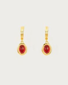 Sass up your lobes with a natural crystal. These gold hoop earrings, crafted with Carnelian—a red stone with a pure yet mysterious shine—are also known as the love stone, having witnessed the world fall in love. Come join the game; the love stone never lies. ✨❤️ Materials: 18k gold plated brass, carnelian stone, stainless steel post Measurement: 30mm/1.18" in length, 14mm/0.55" in width We use natural carnelian stone and each piece is distinct, with variations in color, clarity and inclusion pat En Route Jewelry, Carnelian Stone, Steel Post, Red Stone, Gold Hoop, Gold Hoop Earrings, Natural Crystals, Devon, Fall In Love