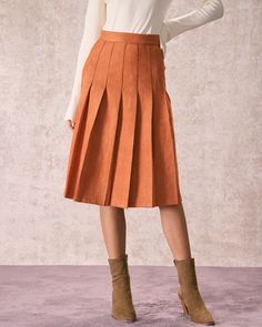 Details:- Orange- Work- Solid Color- Pleated- Zipper Fly- High Waisted- Slim Fit- 80% Polyester, 20% Spandex- Machine wash or professional dryFabric:This Pleated Skirt is made of Polyester and Spandex. Polyester is an artificial fiber that feels soft, looks lustrous, and dries fast. It's also durable, with good resistance to wrinkles, stains, and sunlight. Spandex is lightweight and comfortable to wear, resistant to sweat, has excellent elasticity, and is durable and robust.Description:This High Sunlit Spring, Suede Midi Skirt, Orange Bottoms, Tailored Clothes, Fly High, Perfect Wardrobe, Dressed Down, Feminine Style, Warm Light