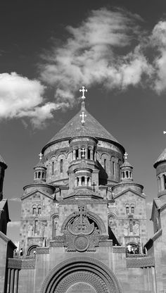 a black and white photo of an old church