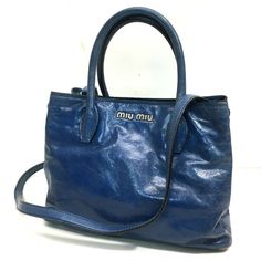 Item Information ITEM NO.: 22000-14453-11 NAME: MIUMIU Shoulder Bag Logo Hardware Hand Bag Hand Bag COLOR: blue MATERIAL: Leather APPROX SIZE: W10.2×H7.9×D5.1inch / W26cm×H20cm×D13cm Listed hand measurements may have a 1-2cm difference. Gender: Women's Spec: [Open type]Magnet type [Inside] Zipper pocket x 2,Open pocket x 1 ADDITIONAL ITEMS: Dust Bag , Shoulder strap , ITEM RANK: Used AB Rank CONDITION DETAILS: Outside:fading of color Handle - Strap:Wrinkles,fading of color Metal fittings part:Mi Luxury Blue Shoulder Bag With Top Carry Handle, Luxury Blue Shoulder Bag, Luxury Blue Top Handle Bag, Luxury Blue Shoulder Bag For Daily Use, Designer Blue Bag With Top Carry Handle, Luxury Blue Handheld Satchel, Luxury Blue Crossbody Satchel, Designer Blue Handheld Satchel, Luxury Blue Top Handle Satchel