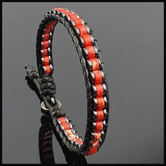 This handmade natural gemstone bracelet made with 2*4 mm roundel red variscite with 1*4 mm Hematite. It is a perfect gift for you and all your loved one for all special days. All our designs prepared by hand according to the your given sizes with love. Wrap is durable 1,5 mm polyester black rope. For closure of our high quality bracelet we used zamak alloys button with 2 optional closure buttonhole. We offer 8 size option between 5.9-8.7 inches (15-22 cm) , please DM us to demand different wrist size. Used Materials; 4*2 mm red variscite 4*1 mm hematite 1 cm zamak alloys button 1.5 mm black korean rope ☆ABOUT US☆ https://www.etsy.com/shop/SevenArtJewelry?ref=listing-shop2-all-items-count#about ☆OUR POLICIES☆ https://www.etsy.com/shop/sevenartjewelry#policies Thanks for your visit Seven Art Adjustable Red Coral Jewelry Gift, Gift Red Coral Bracelet With Gemstone Beads, Handmade Adjustable Red Wrap Bracelet, Adjustable Red Handmade Wrap Bracelet, Red Wrap Bracelet With Round Beads, Red Adjustable Gemstone Beaded Bracelets, Adjustable Red Beaded Gemstone Bracelets, Adjustable Red Gemstone Beaded Bracelets, Red Hand Wrapped Wrap Bracelet As Gift