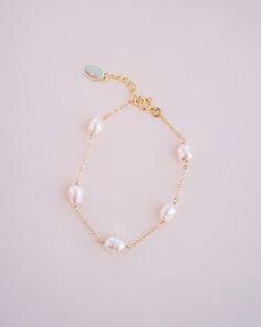 Leighton Pearl Bracelet – Wander + Lust Jewelry Delicate Baroque Pearl Bracelet With Pearl Chain, Delicate Baroque Pearl Chain Bracelet, Delicate Baroque Pearl Bracelet, Minimalist Baroque Pearl Bracelets, Minimalist Baroque Pearl Bracelet, Elegant White Wire Wrapped Pearl Bracelet, Dainty Baroque Pearl Bracelet Gift, Adjustable Dainty Baroque Pearl Bracelet, Dainty Adjustable Baroque Pearl Bracelet