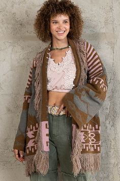 Fringe Shawl Cardigan For Fall, Oversized Fringe Sweater For Winter, Oversized Bohemian Outerwear With Fringe, Bohemian Shawl Sweater For Fall, Fall Bohemian Shawl Sweater, Oversized Fringe Cardigan For Fall, Bohemian Fringe Winter Cardigan, Bohemian Winter Sweater With Tassels, Bohemian Winter Cardigan With Tassels