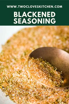 a wooden spoon filled with seasoning on top of a white plate