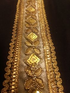 OFFER - Quantity Discount on buying more than 1 yard. Check length option to know prices. This is Indian Gold Floral Embroidered Sequin Jacquard Ribbon Lace Trim With Embellishment Design For Crafting, Sewing And Cloth Accessories. Border For Crafting, Sewing And Cloth Accessories. This lace trim is highly demanded everywhere else to modify look of any party wear dress and other fancy item. This trim lace border is used in many crafting, designing, artifacts such as... * To Design (Wedding Wear Elegant Machine Embroidered Fabric For Festive Occasions, Gold Embroidered Fabric For Festive Occasions, Gold Festive Embroidered Fabric, Festive Machine Embroidered Fabric For Parties, Traditional Gold Machine Embroidered Fabric, Traditional Gold Embroidered Fabric With Machine Embroidery, Traditional Machine Embroidered Fabric For Wedding, Bohemian Embroidered Fabric With Gold Embroidery For Festive Occasions, Bohemian Embroidered Fabric With Gold Embroidery