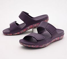 Playfully printed with an eye-catching pattern, these slide sandals are ready for all your summertime adventures. From Alegria. Purple Slide Sandals For Summer, Purple Synthetic Slides For Summer, Vacation Sandals With Cushioned Footbed In Purple, Purple Slip-on Slides For Beach, Purple Slip-on Beach Slides, Purple Slip-on Slides For The Beach, Casual Purple Open Toe Slides, Purple Slip-on Slides For Summer, Comfortable Purple Sandals For Summer