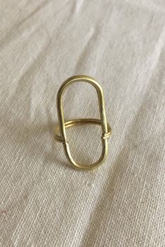 This ring elongates Modern Handmade Oblong Jewelry, Modern Brass Open Ring, Modern Oval Link Rings For Everyday, Minimalist Handmade Oblong Jewelry, Modern Everyday Rings With Oval Link, Hand Forged Oval Brass Rings, Yoga Jewelry, Modern Ring, Statement Ring