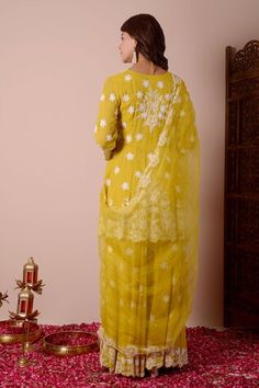 Mustard yellow kurta with dori, sequin embroidery in floral pattern. Paired with gharara and dupatta. - Aza Fashions Designer Yellow Palazzo Set With Chikankari Embroidery, Designer Yellow Chikankari Embroidery Palazzo Set, Yellow Chikankari Embroidered Palazzo Set, Festive Yellow Chikankari Palazzo Set, Yellow Palazzo Set For Diwali, Yellow Sharara With Straight Kurta, Yellow Chikankari Embroidery Palazzo Set For Eid, Festive Yellow Palazzo Set With Chikankari Embroidery, Wedding Yellow Palazzo Set With Straight Kurta