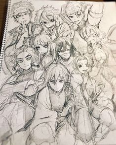 a drawing of some anime characters on a sheet of paper with pencils in front of them