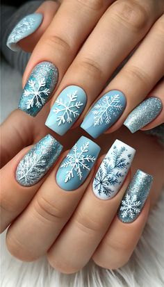 Make this holiday season extra special with 30+ unique December nail ideas! From elegant winter blues and whites to bold Christmas colors, each design in this collection offers something fresh for 2024. Whether you’re after simple or intricate designs, these nail ideas will keep your hands looking festive and fashionable. Simple Christmas Nails Blue, Blue Winter Nail Ideas, Christmas Blue Nails, December Nails Ideas, December Nail Ideas, Nail Art Noel, Festive Manicure, Navy Blue Nails, Dark Red Nails