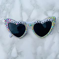 These statement heat shaped oversized sunglasses embellished with Irridescent rhinestones make the perfect gift and statement for a celebration.  There are many styles, designs and colours available, please check my shop! Trendy Cat Eye Sunglasses For Parties, Party Sunglasses With Mirrored Lenses, Party Sunglasses With Mirrored Lenses And Glass Frame, Fun Sunglasses With Gradient Lenses For Parties, Silver Sunglasses For Summer Parties, Trendy White Cat Eye Sunglasses For Party, Party Sunglasses With Mirrored Glass Lenses, Glamorous Party Sunglasses With Gradient Lenses, Silver Party Sunglasses With Uv Protection