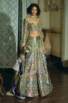 Grey attached cancan lehenga with  zari and zardosi embroidery. Paired with a padded blouse with floral motif embroidery, embellished with pearl tassels and an embroidered dupatta with pearl tassels. - Aza Fashions Luxury Unstitched Lehenga With Printed Motifs, Fitted Tissue Silk Choli With Cutdana, Fitted Art Silk Palazzo Set For Reception, Fitted Tissue Silk Choli With Intricate Embroidery, Fitted Intricate Embroidery Tissue Silk Choli, Fitted Chanderi Choli With Intricate Embroidery, Designer Wear Brocade Sets With Intricate Embroidery, Navratri Brocade Choli With Resham Embroidery, Semi-stitched Brocade Choli For Reception