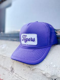 Purple Trucker Snapback Hat, adjustable Spring Adjustable Trucker Hat For Sports Events, Adjustable Flat Brim Hat For Baseball Season, Purple Snapback Trucker Hat, Casual Purple Snapback Trucker Hat, Adjustable Flat Brim Trucker Hat For Baseball Season, Adjustable Trucker Hat With Flat Brim For Baseball Season, Trendy Sports Cap For Events, Adjustable Flat Bill Hat For Game Day, Game Day Flat Bill Adjustable Hat