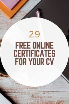 a laptop computer sitting on top of a wooden table with the words 29 free online certificates for your cv