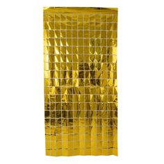 a gold foiled piece of paper with squares on it