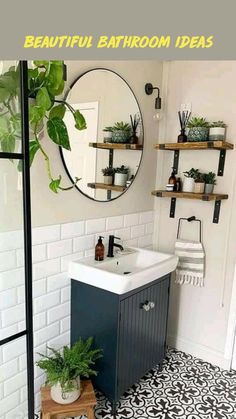 a bathroom with black and white tile flooring next to a sink, mirror and potted plants