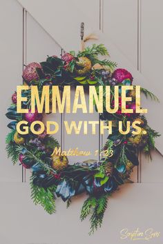 a christmas wreath with the words, emmanuelel god with us