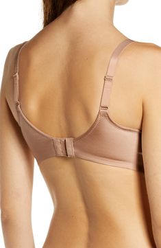 This lightweight yet powerful bra is designed to lift the bustline up to one inch, while a wire-free band contours to your body so it never pinches or restrains. Partially lined 55% nylon, 45% spandex Hand wash, line dry Imported Full Coverage Shaping Nursing Bra With Built-in Bra, Full Coverage Shaping Nursing Bra, Full Coverage Shaping Nursing Bra With Padded Cups, Shaping Full Coverage Nursing Bra With Padded Cups, Full Coverage Stretch Nursing Bra, Full Coverage Stretch Bra With Moderate Back, Underbust Nursing Bra With Adjustable Straps, Adjustable Straps Underbust Nursing Bra, Shaping Bra With Medium Bust Support And No-show Design