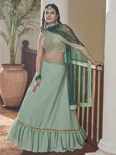 Buy exotic sea green silk embroidered lehenga choli for celebrating an upcoming festival celebrations. Shop this superior lehenga choli which comes with a Silk blouse and Net dupatta. Green Lehenga Choli, Georgette Anarkali Suits, Black Wedding Gowns, Butterfly Net, Lehenga Suit, Green Lehenga, Lehenga Online, Embroidered Lehenga, Anarkali Gown